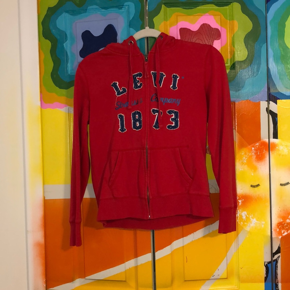 Slightly worn >3x. Light hooded zip up